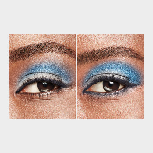 close up of an eye with blue eye shadow
